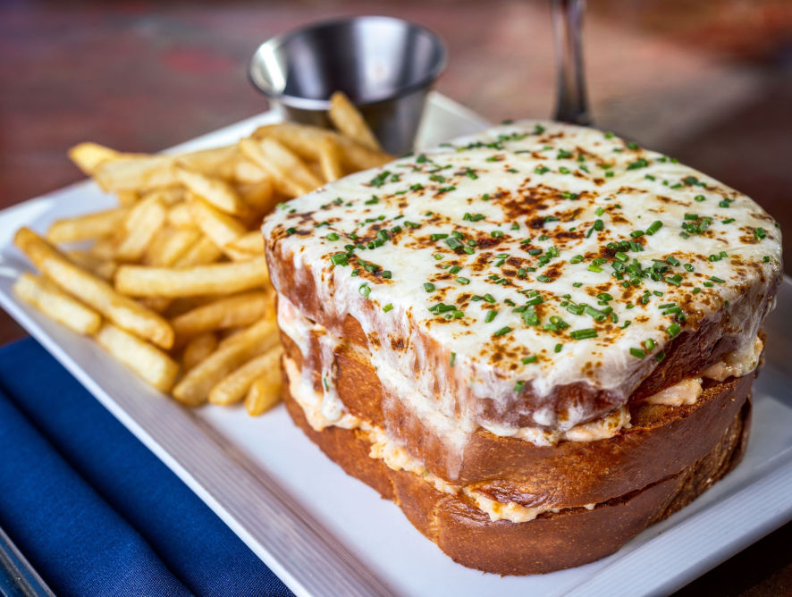 Lobster and crab grilled cheese served with fries