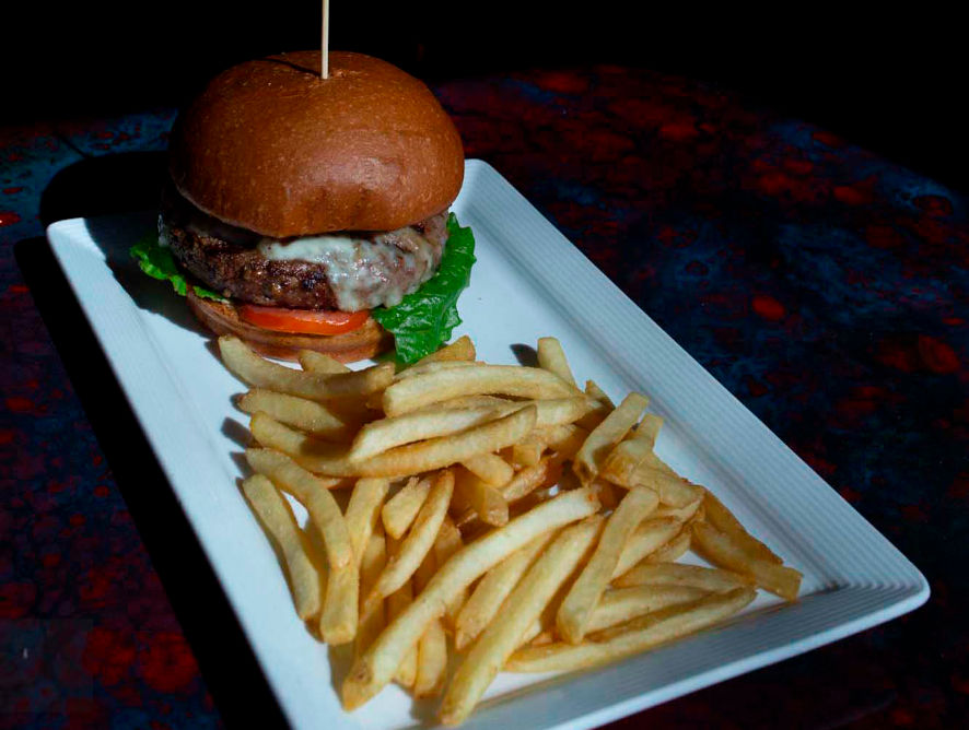 8oz. Wagyu patty, smoked cheddar, lettuce, tomato, chef sauce burger served with fries
